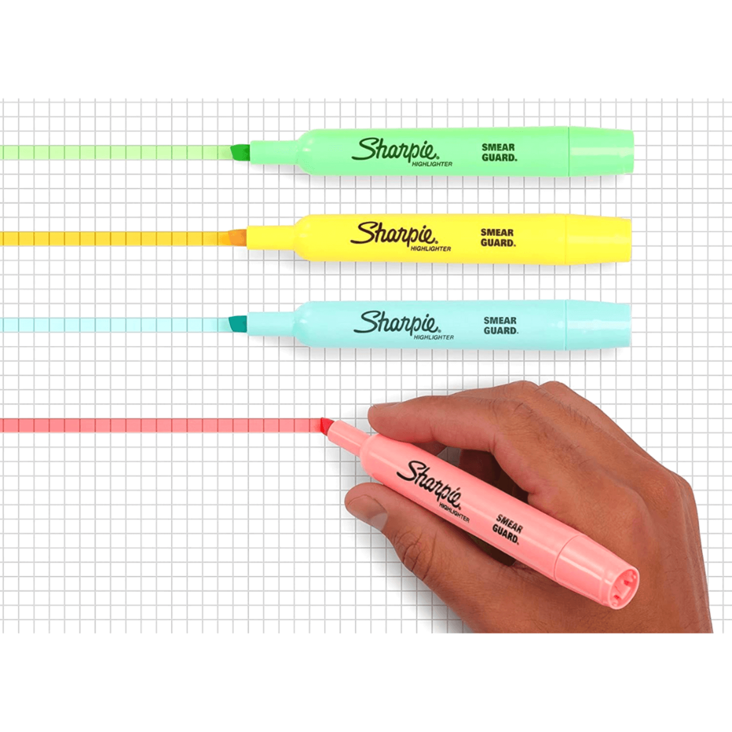 Destacadores Sharpie Tank 6 Colores Pastel y Punta Cincel sobre un cuaderno a cuadros.