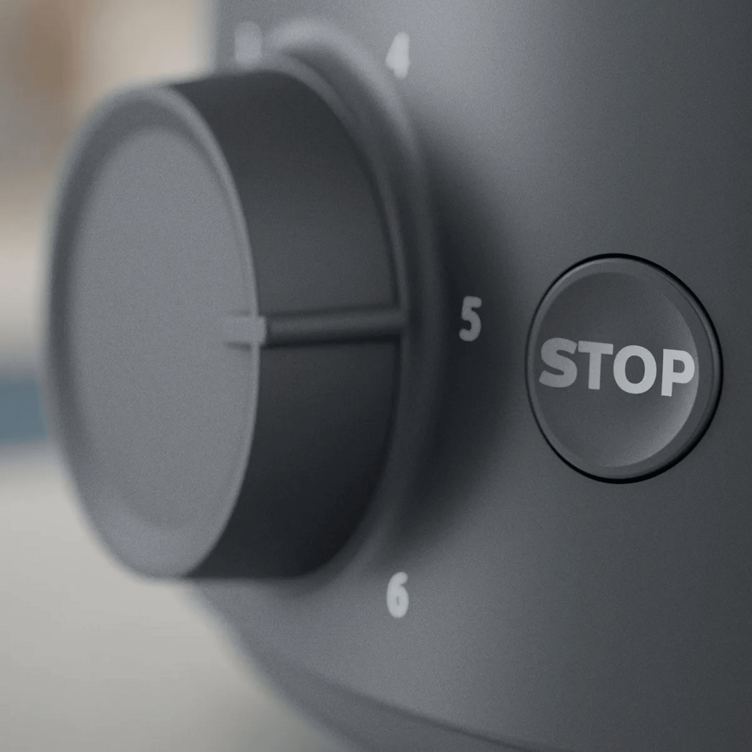 detalle del botón de stop y el dial del tostador Philips negro 2 rebanadas 650W