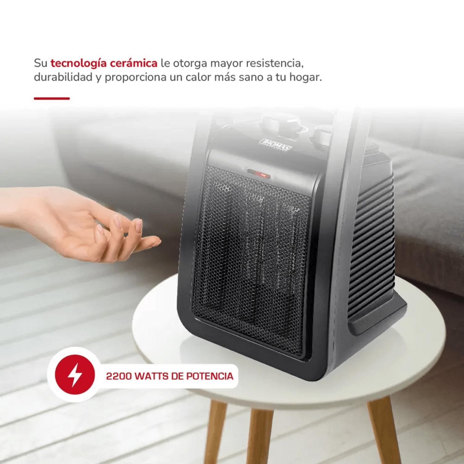Calefactor Cerámico Thomas 2200W TH-CH38 2 Temp Antivuelco en mesa, destacando su tecnología cerámica y potencia.